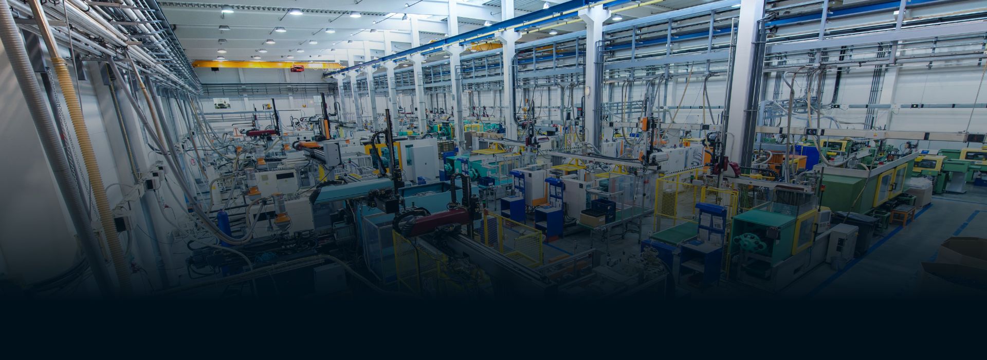 automated manufacturing plant overhead shot with blue gradient