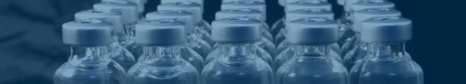 capped vials of liquid pharmaceuticals